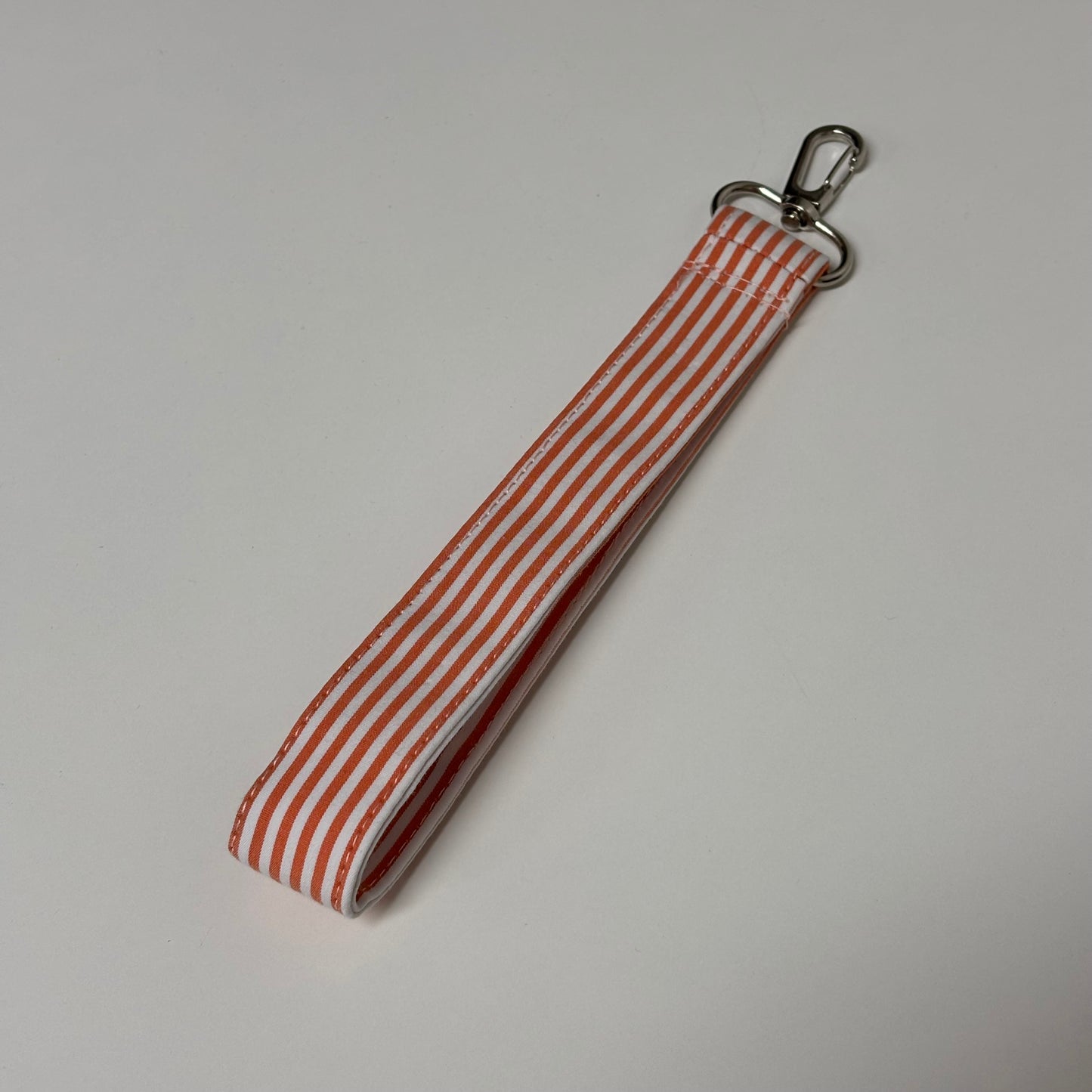Orange Striped Wristlet